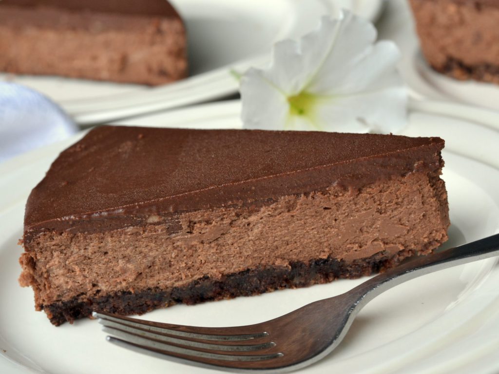 Decadent chocolate cheesecake made on a Memphis Grill.