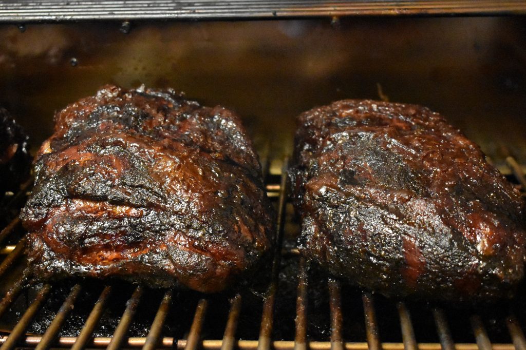 Two Pork Shoulders on a Memphis Grill